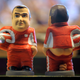 Image for article titled These Pooping F1 Driver Figurines Actually Have A Christmas Purpose